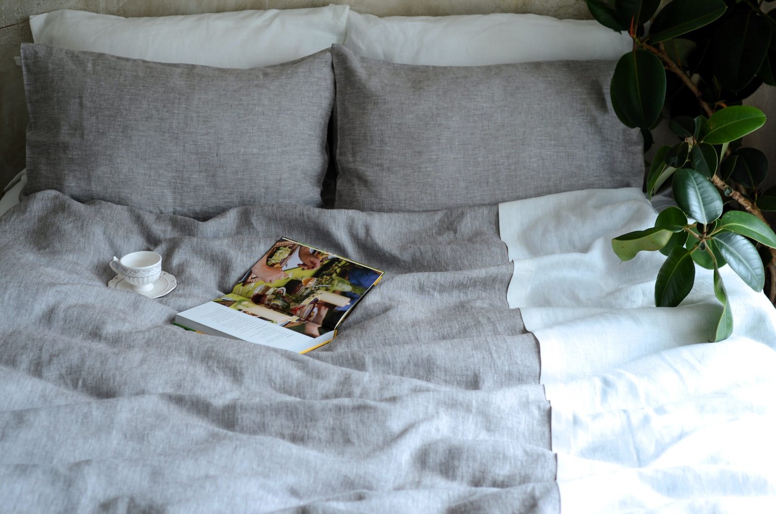 duvet set of three from midweight linen in cacao melange with decowhite lace and coconut buttons. Pillowcases are in envelope closure.